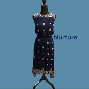 NURTURE NAVY DRESS WITH WHITE EMBROIDERED FLOWERS SIZE SMALL GENTLY WORN
